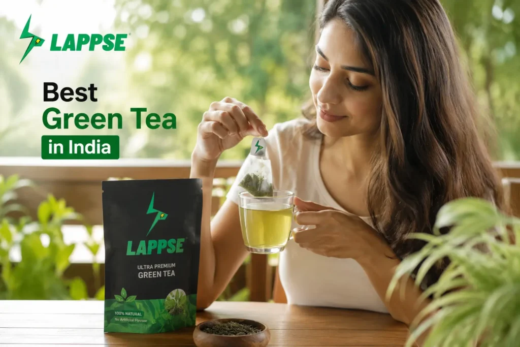 Woman dipping a Lappse green tea bag into a cup of hot tea while enjoying the best green tea in India.